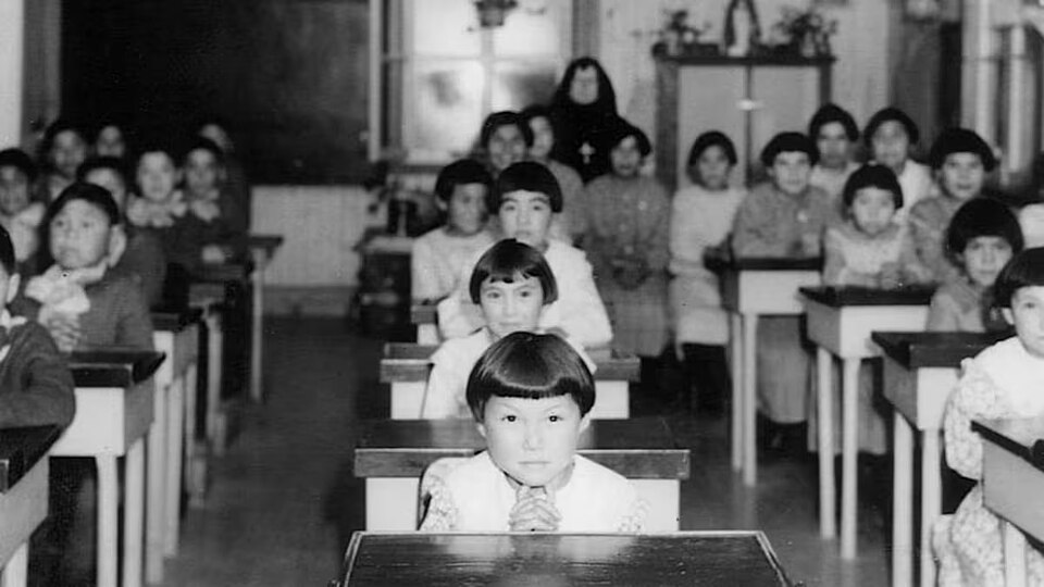 Children in class at the Catholic residential school of Fort George, QC (1939).jpg